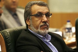 عکس آقازادهی خاوری در ونکوور روی بنر خرید املاک!