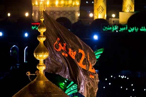 لحظه تغییر پرچم حرم امام حسین (ع) برای آغاز محرم