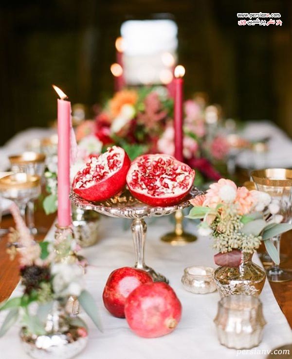 زیبایی شمع و انار روی میز جدیدترین تزیینات شب یلدا